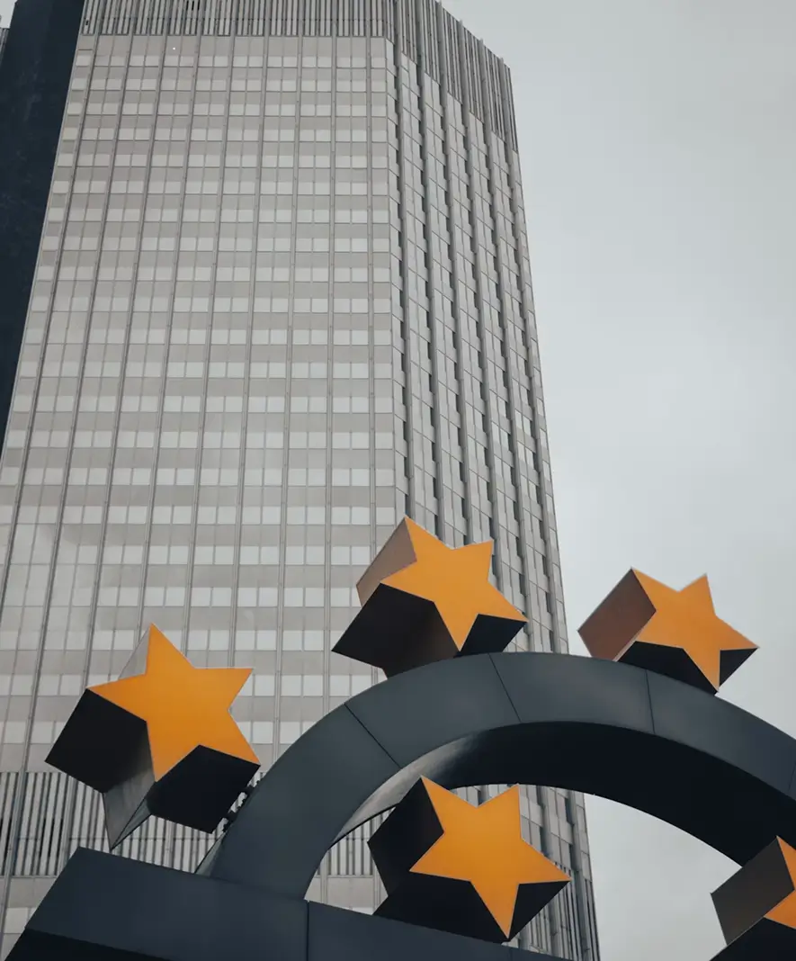 European financial institution building with euro symbol stars